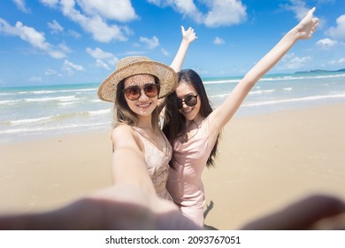 Beautiful young woman doing selfie on the beach. Relax travel on the beach concept - Powered by Shutterstock