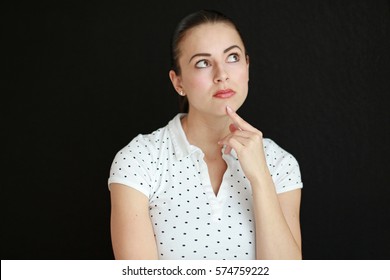 A Beautiful Young Woman Is Doing Some Heavy Thinking.