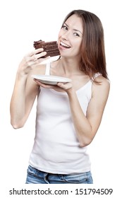 Beautiful Young Woman Eating Chocolate Cake