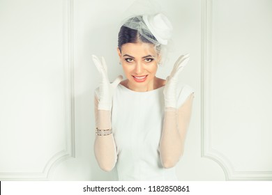 Beautiful Young Woman In Elegant Bridal Outfit Holding Hands In Air In Stress While Frowning Looking At You Camera With Annoyed Expression On White Background. Retro Vintage Hair  Clothing Style Bride