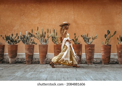 beautiful young woman in  elegant dress outdoors