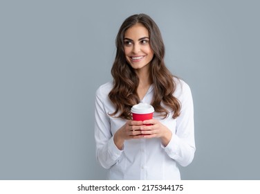 Beautiful Young Woman Enjoying A Cup Of Coffee While Relaxing. People, Drinks And Leisure Break, Happy Young Woman With Cup Of Tea Or Coffee.