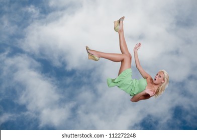 A Beautiful Young Woman Falling Through The Sky