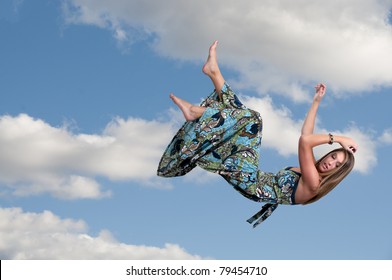 A Beautiful Young Woman Falling Through The Sky