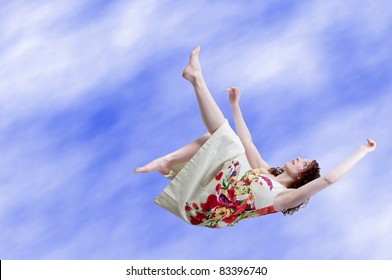 A Beautiful Young Woman Falling Through The Sky