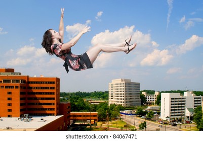 A Beautiful Young Woman Falling Through The Sky