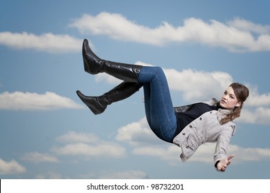 A Beautiful Young Woman Falling Through The Sky