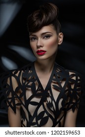 Beautiful Young Woman With Fancy Hairdo And Red Lips