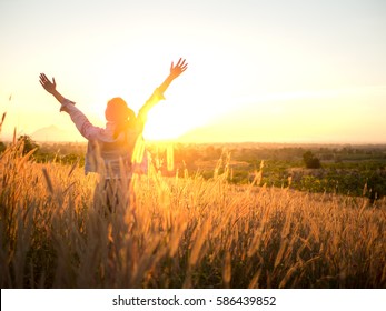 Beautiful Young Woman in a field.