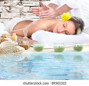 Beautiful young woman getting spa massage.
