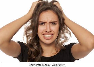 Beautiful Young Woman Has An Itch In Her Hair On White Background