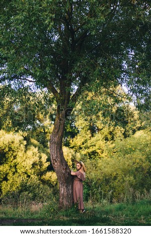 Similar – Portrait of a young man in nature