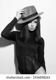Beautiful Young Woman In Hat And Underwear. Fashion Beauty Black And White Portrait