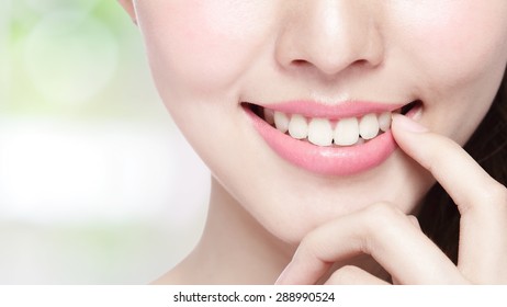 Beautiful Young Woman Health Teeth Close Up And Charming Smile. Isolated On Green Background, Asian Beauty