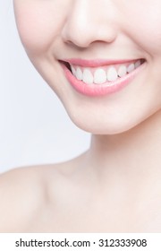 Beautiful Young Woman Health Teeth Close Up And Charming Smile. Isolated Over White Background, Asian Beauty