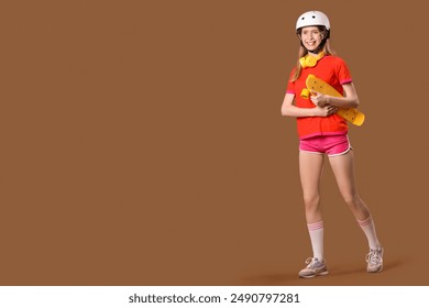 Beautiful young woman in helmet with skateboard on brown background - Powered by Shutterstock