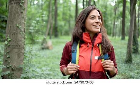 Beautiful, young woman hiking and enjoying in the nature - Powered by Shutterstock