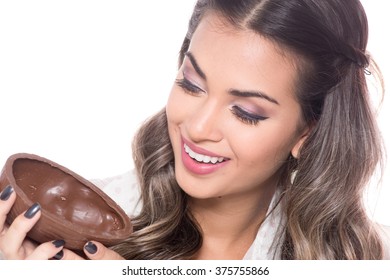 Beautiful Young Woman Holding A Chocolate Egg