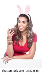 Beautiful Young Woman Holding A Chocolate Egg