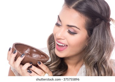 Beautiful Young Woman Holding A Chocolate Egg