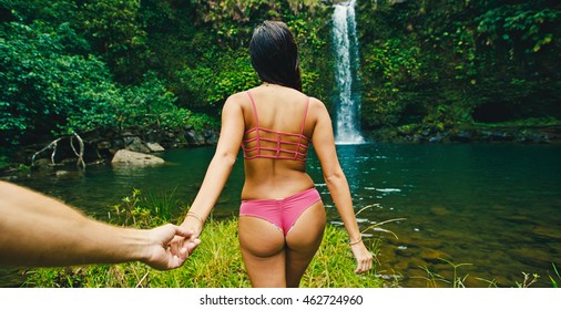 Beautiful Young Woman Leading Man To Waterfall, POV Perspective View