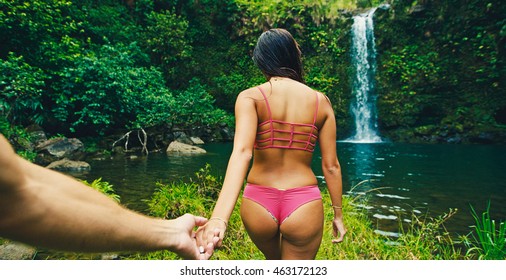 Beautiful Young Woman Leading Man To Waterfall, POV Perspective View