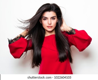 Beautiful Young Woman With Long Black Hair Wearing Red Dress