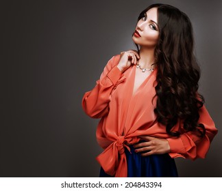 Beautiful Young Woman With Long Hair And Jewelery.