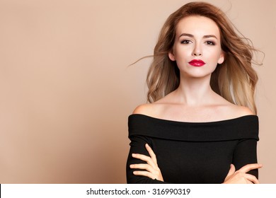 Beautiful Young Woman With Long Hair And Jewelery.