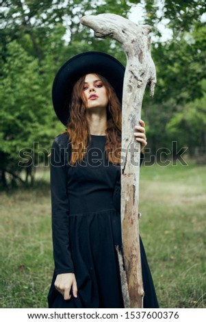 beautiful young woman model in a forest glade