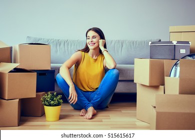 Beautiful Young Woman Moving To New Home