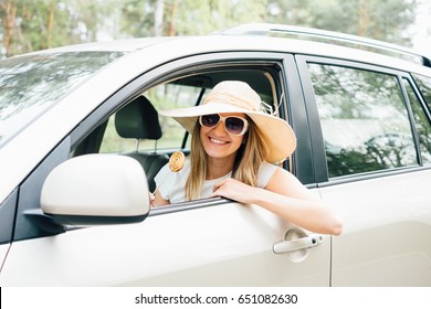 Beautiful Young Woman In The Nice Car Is Going To Vacation To The Beach