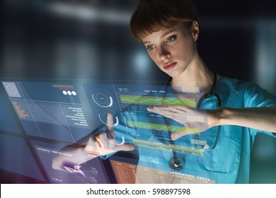 Beautiful Young Woman Nurse Or Doctor Using Innovative Technology To Monitor Patient Data, Mixed Media