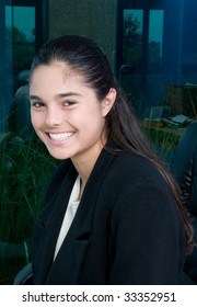 Beautiful Young Woman In An Office Setting