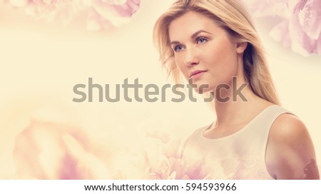 Beautiful young woman on a pink floral background