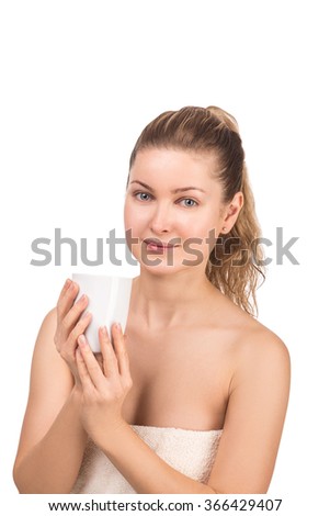 beautiful young woman on white background with cup of tea in a towel after bath