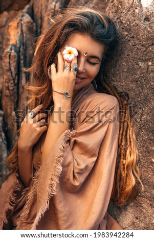 beautiful young woman outdoors portrait at sunset