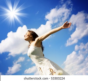 Beautiful Young Woman Over Blue Sky