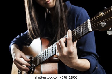 Beautiful Young Woman Playing Acoustic Guitar