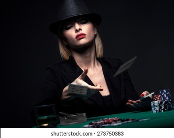 Beautiful Young Woman Playing Poker