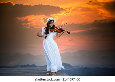  Beautiful Young Woman Playing Violin Outside Nature.