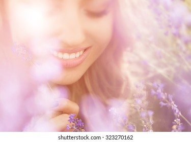 Beautiful Young Woman Portrait In Lavender Field