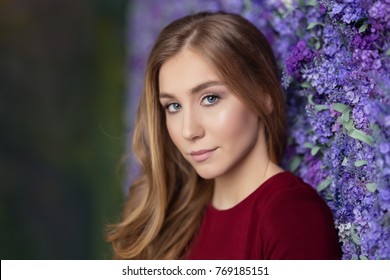 Beautiful Young Woman Portrait. Looking At Camera. Beautiful Face. Blue Eyes. Close-up Portrait. Indoor Photo.  Selective Focus.