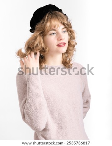 Similar – Young happy woman sticking out her tongue