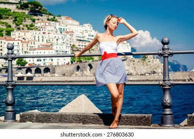Beautiful Young Woman Posing In Atrani Town In Amalfi Coast. Italy