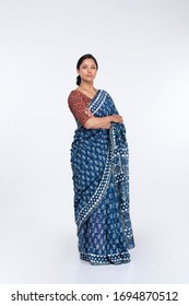 Beautiful Young Woman Posing In Traditional Saree On White.