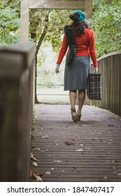 Beautiful Young Woman Posing In Vintage 1940s Clothes, On A Bridge, Focussing On Legs