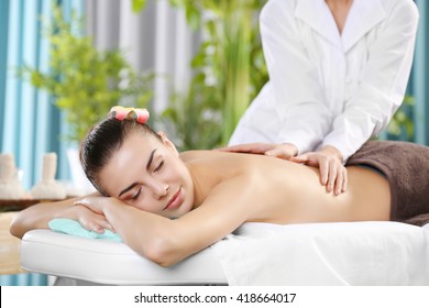 Beautiful Young Woman Relaxing With Hand Massage At Beauty Spa