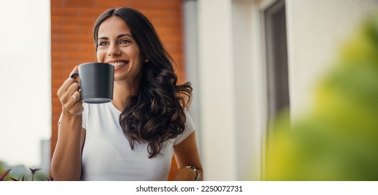 beautiful young woman relaxing over a cup of tea - Powered by Shutterstock