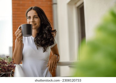 beautiful young woman relaxing over a cup of tea - Powered by Shutterstock